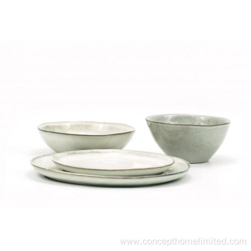 Reactive glazed stoneware dinner set in light grey